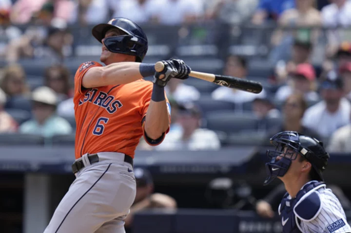 Meyers hits 2 homers and the Astros go deep 4 times to beat the Yankees 9-7 for a 4-game split