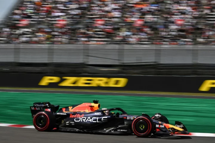 'Fired up' Verstappen takes Japanese GP pole position