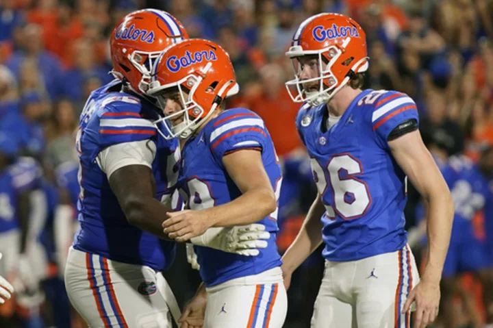 No. 22 Florida looks to halt recent slide against unbeaten Kentucky in SEC East Division showdown