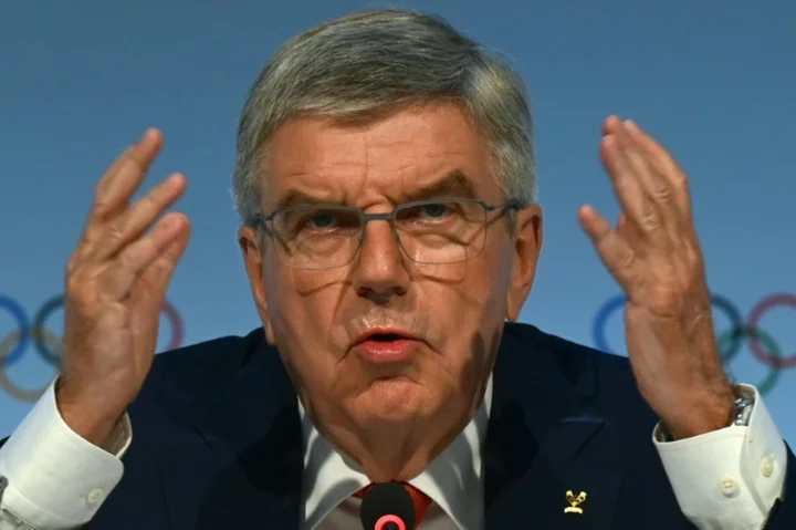 IOC president Bach coy as members call for rule change to extend his term