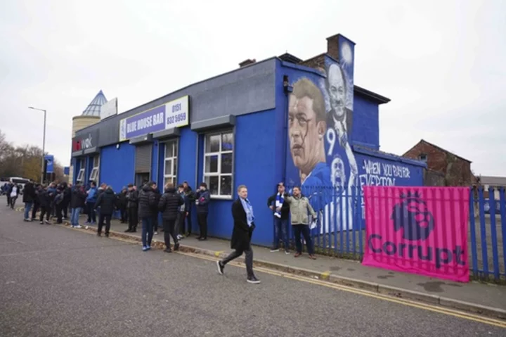 Angry Everton fans march to Goodison Park in protest at 10-point deduction in Premier League