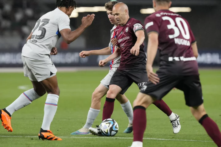 Iniesta says goodbye to old friends at Barcelona in friendly in Tokyo