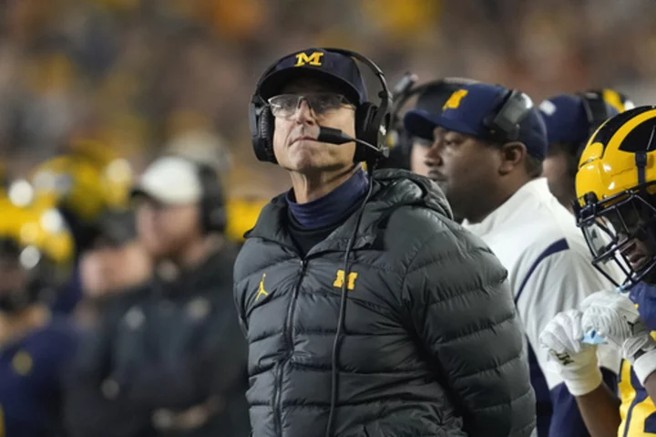 Michigan prepared to take Big Ten to court if punished without full investigation, AP source says