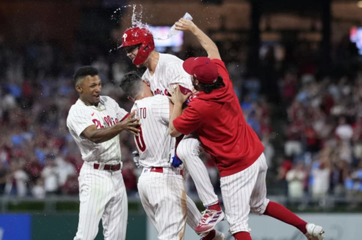 Phillies beat the Giants 4-3 to increase cushion in NL wild-card race