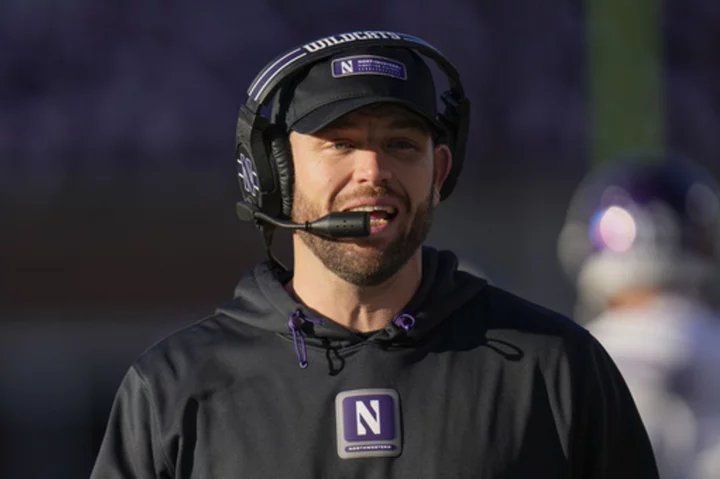 Northwestern's Braun named Big Ten coach of the year. Coaches vote 8 Michigan players to 1st team