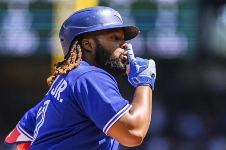 Blue Jays get homers from Guerrero and Belt before Romano holds off the Mariners, 4-3