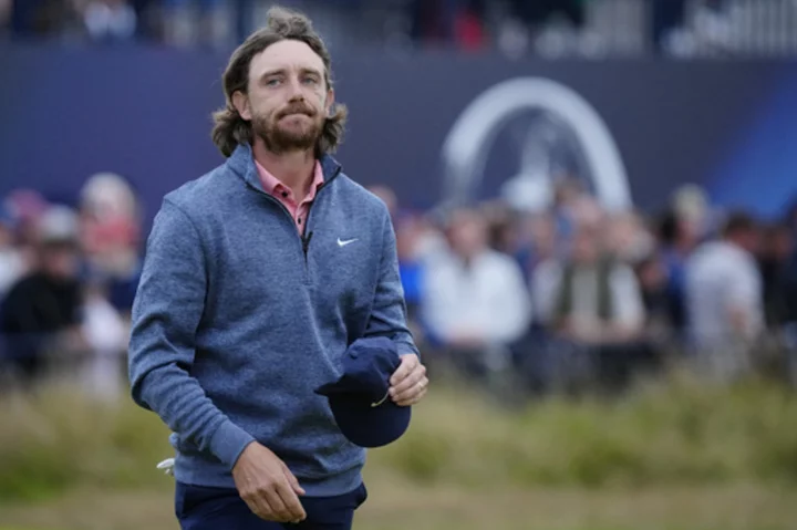 Fleetwood keeps alive home hopes at British Open as nearest challenger to Harman