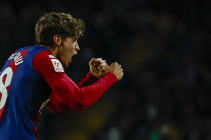 17-year-old Guiu scores seconds into his first-team debut to give Barcelona a Spanish league victory