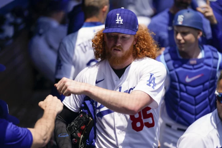Dodgers' starter May leaves after 1 inning vs. Twins due to right elbow pain
