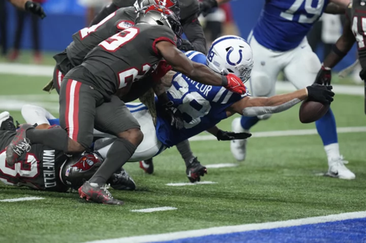Jonathan Taylor scores twice to help the Colts overpower Buccaneers run defense for 27-20 win