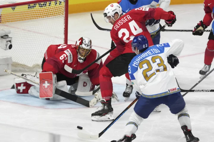 Switzerland shuts out Kazakhstan 5-0, Denmark beats Austria 6-2 at ice hockey worlds