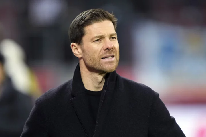 Xabi Alonso signs a contract extension as coach of Bayer Leverkusen after a strong first season