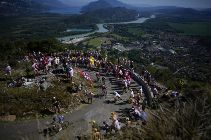 Kwiatkowski wins mountaintop Tour stage, Pogacar cuts into Vingegaard's lead with late attack
