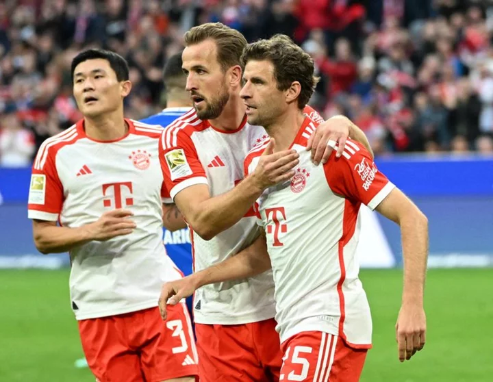 Soccer-Bayern crush Darmstadt 8-0 with Kane hat-trick amid sea of red