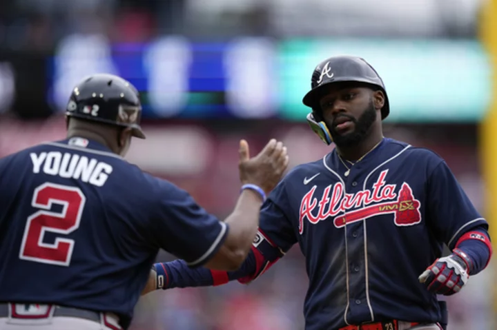 Ozuna homers during 5-run 10th inning, Braves beat Phillies 5-1 for 8th straight win