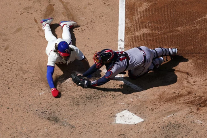 Braves survive Bryce Harper's tying homer in 9th to beat Phillies 10-8 in Game 1 of doubleheader