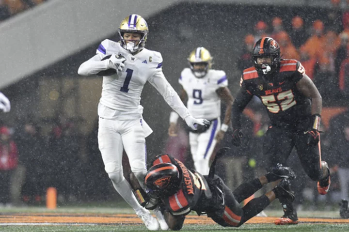 No. 4 Washington seeks perfect regular season hosting rival Washington State in Apple Cup