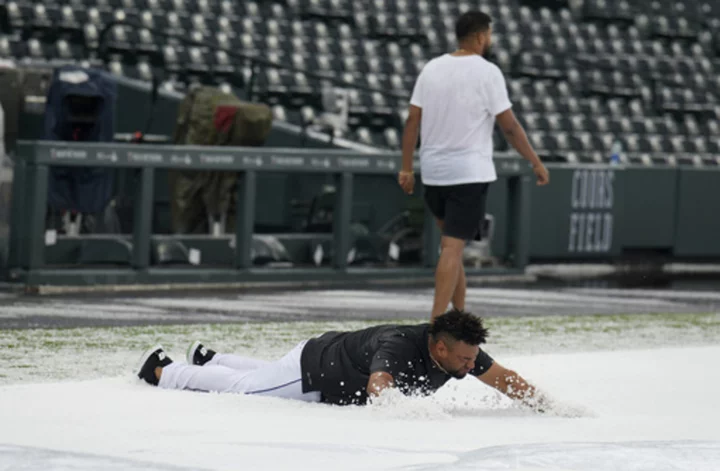 All Hail the Rockies! Pea-sized hail makes Coors Field a winter wonderland ahead of Dodgers game