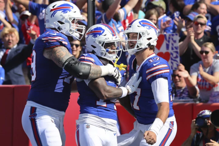 Josh Allen throws 4 TD passes, runs for score, Bills rout division rival Dolphins 48-20