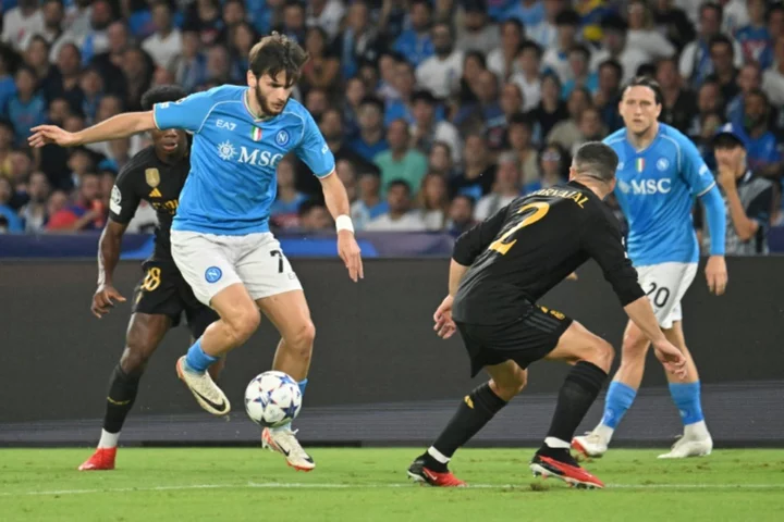 Kvaratskhelia double fires Napoli to win at Verona