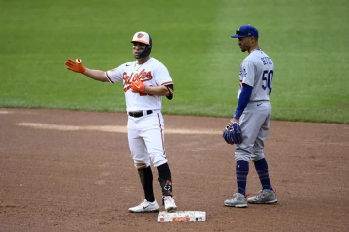 Urías has 3 RBIs for Orioles, who beat Dodgers 8-5 and avoid first series sweep in 14 months