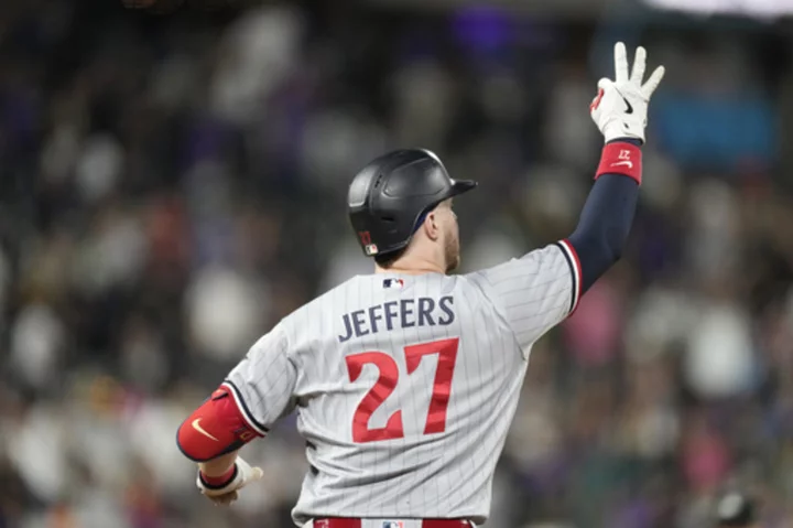 Playoff-bound Twins hit 3 homers in 7-6 victory over Rockies