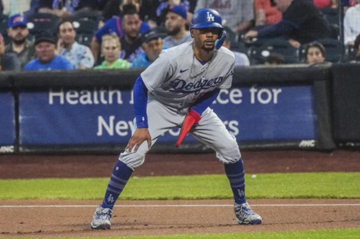 Betts' big night leads the Dodgers to a 5-1 victory over the sloppy Mets