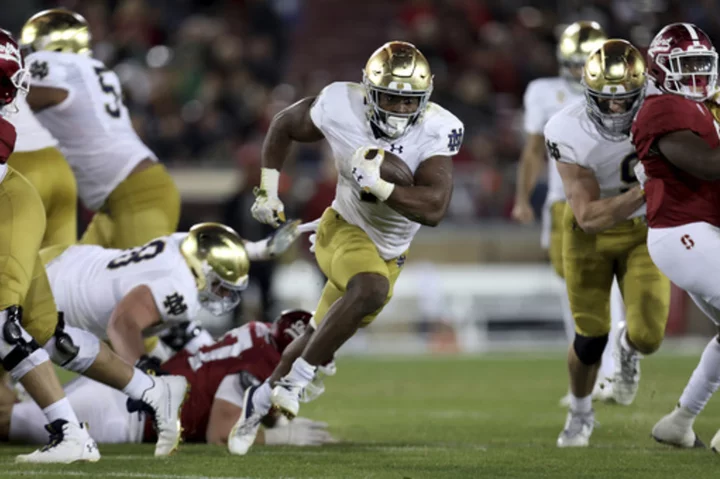 Audric Estimé scores 4 TDs, No. 17 Notre Dame routs Stanford 56-23