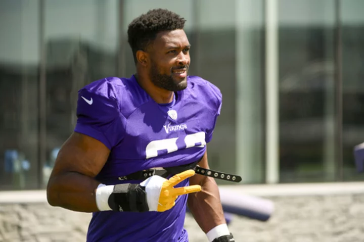 Vikings' Hunter is happy to be over the contract hump, for now, and get back to practice