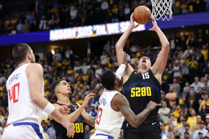Jokic leads Nuggets past Clippers, Warriors and Wolves brawl