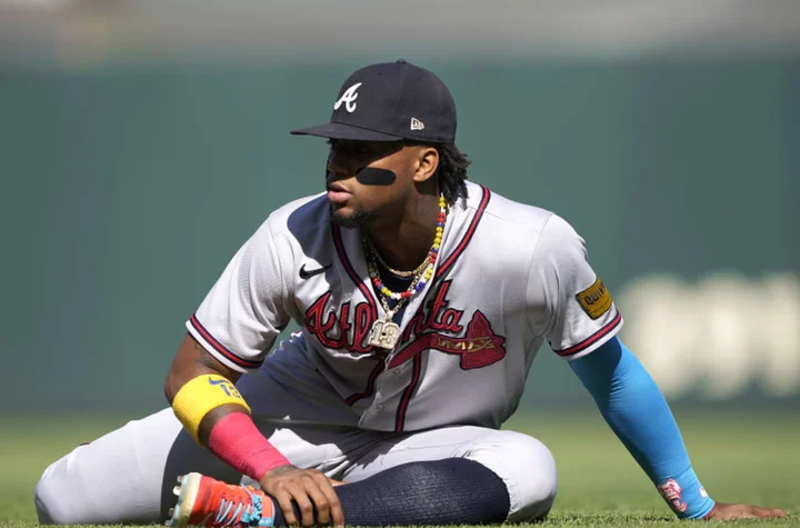 Ronald Acuña Jr. knocked over by field rushers in worrying scenes at Braves game