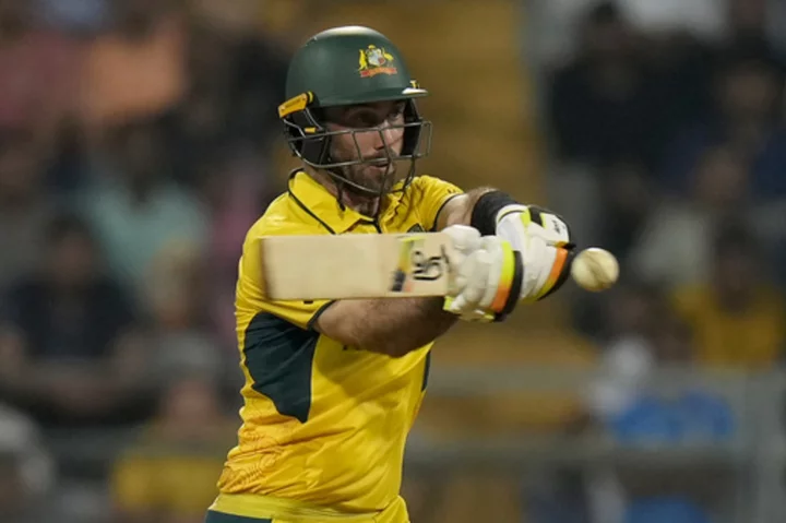 Glenn Maxwell smashes astonishing 201 to lead Australia past Afghanistan at Cricket World Cup