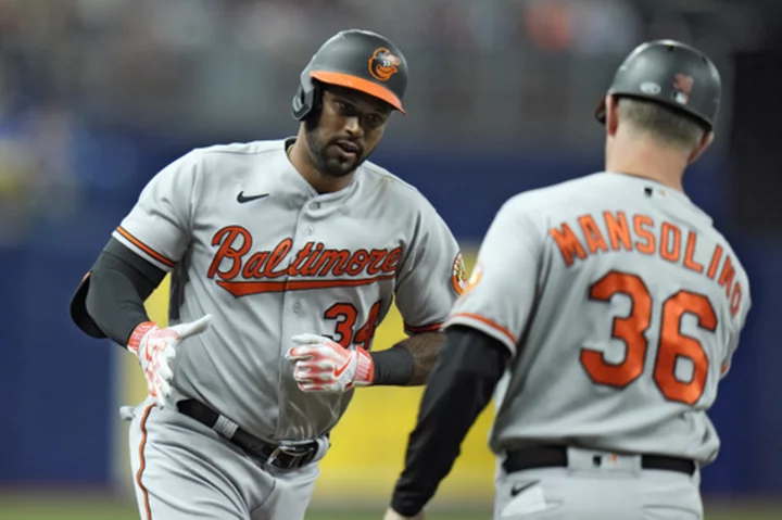 Aaron Hicks drives in 4 runs as the Orioles hold on to beat the AL East-leading Rays