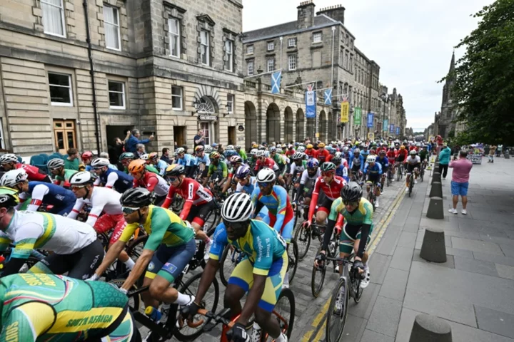 Five arrested as protest halts road race at cycling worlds