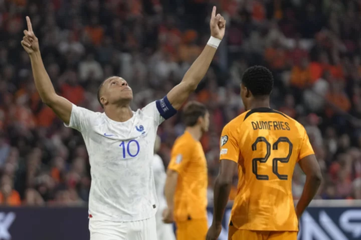 Kylian Mbappé scores 2 as France beats Netherlands 2-1 to qualify for European Championship
