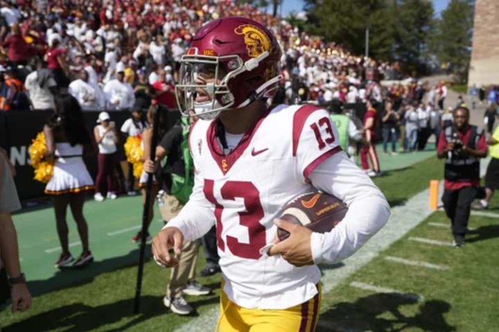 Caleb Williams throws for 403 yards and No. 8 Southern California beats Colorado 48-41