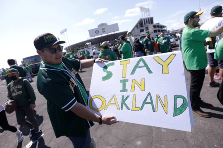 A's fans come out en masse for reverse boycott and tell owner John Fisher to sell