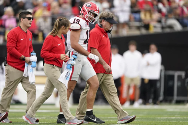 No. 1 Georgia loses Bowers early, scores 27 straight to beat Vandy 37-20