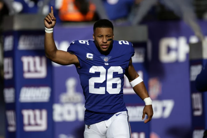 Saquon Barkley, Giants settle on 1-year deal worth up to $11 million, AP source says