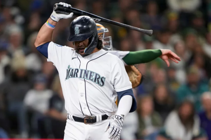 Mariners drop into tie for AL West lead with 3-1 loss to A's as Rodriguez, Kirby scratched