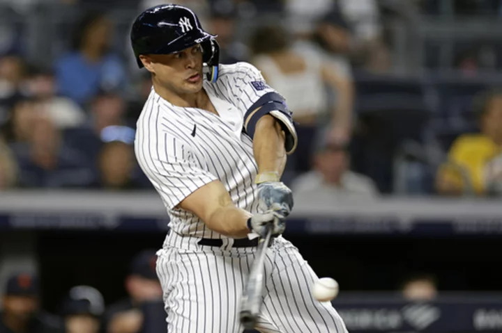 Stanton hits his 400th home run to lead Cole and the Yankees to a 5-1 victory over the Tigers