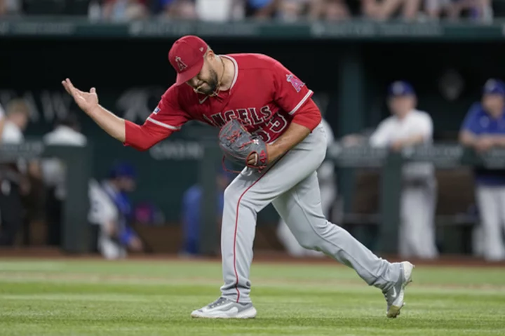 Harper hits 2 solo home runs, Nola pitches 5 innings as Phillies beat Blue Jays 9-4