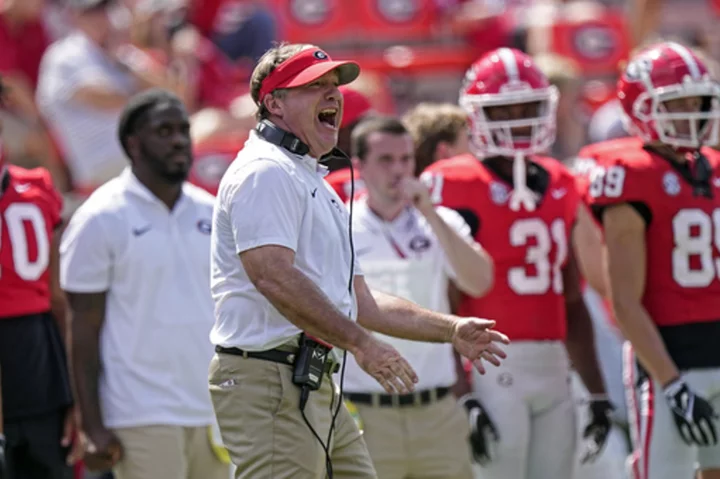 S Javon Bullard of top-ranked Georgia sits out practice with an ankle injury