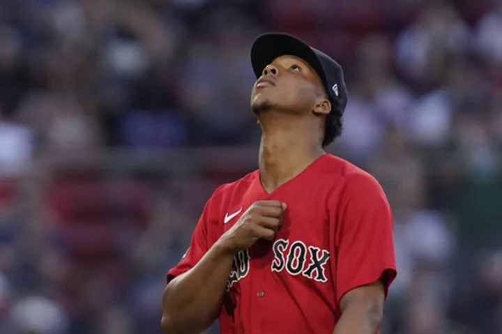 Marlins no-hit through seven, beat Red Sox 2-0