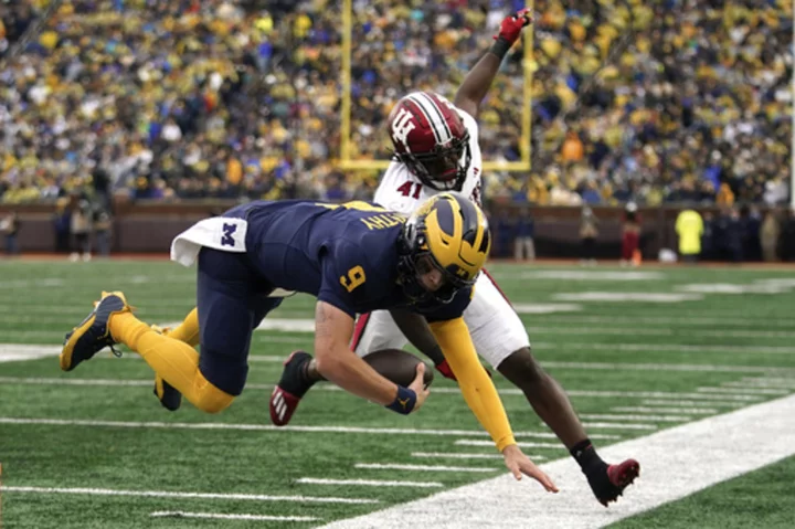 No. 2 Michigan starts slow and finishes strong in 52-7 win over Indiana to stay unbeaten