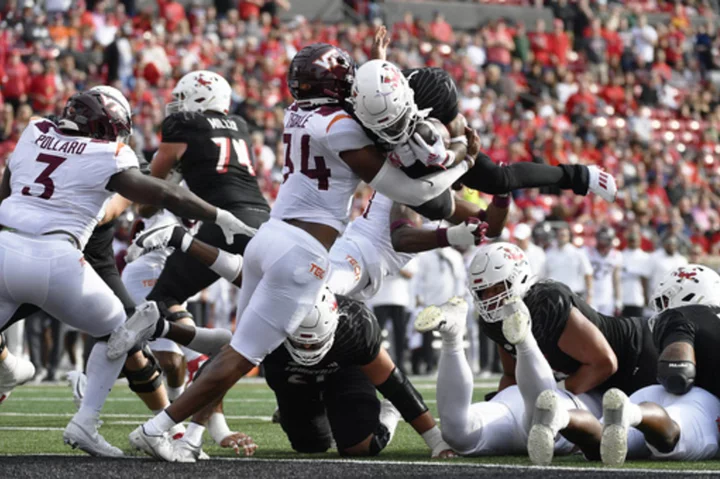 No. 11 Louisville hosts Virginia, looking to move closer toward clinching an ACC title-game berth