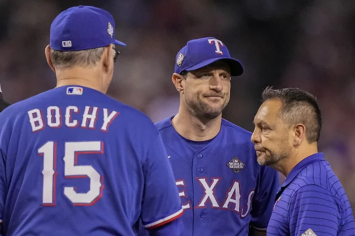 Rangers' Max Scherzer forced from World Series Game 3 by back tightness
