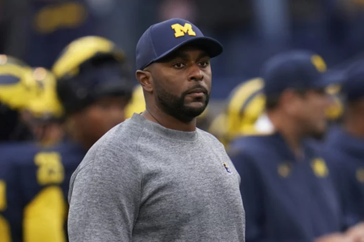 Michigan suspends offensive coordinator Sherrone Moore for violating NCAA rules