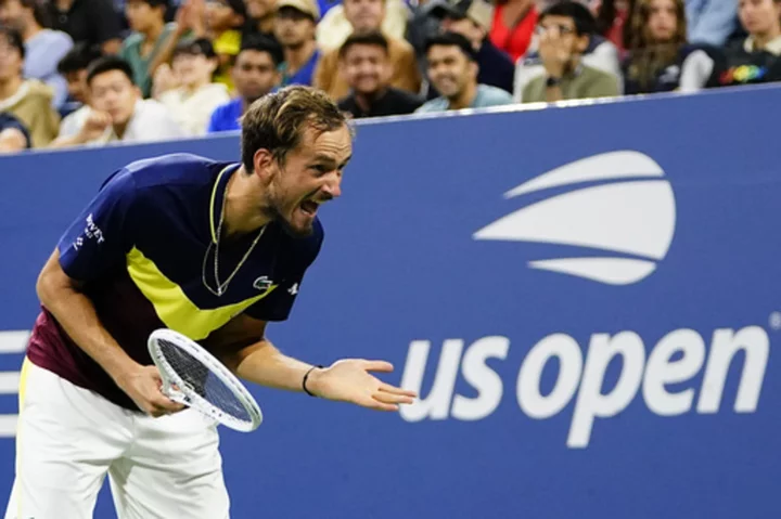US Open players differ on how to approach the stress of a match point. Swing away or stay safe?