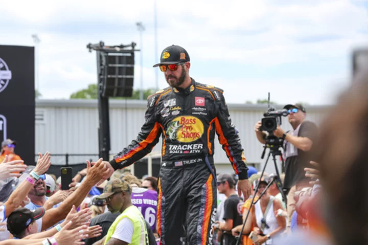 NASCAR Cup Series points leader Martin Truex Jr. re-signs with Joe Gibbs Racing for 2024